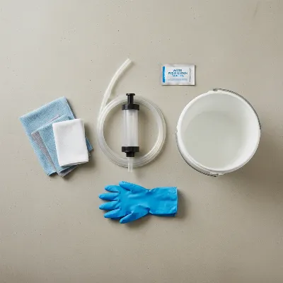 Arrangement of water rower cleaning tools: pump, bucket, purification tablets, gloves, cloths.